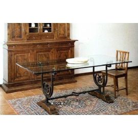 TAVOLO CONCRISTALLO E GAMBE IN FERRO BATTUTO